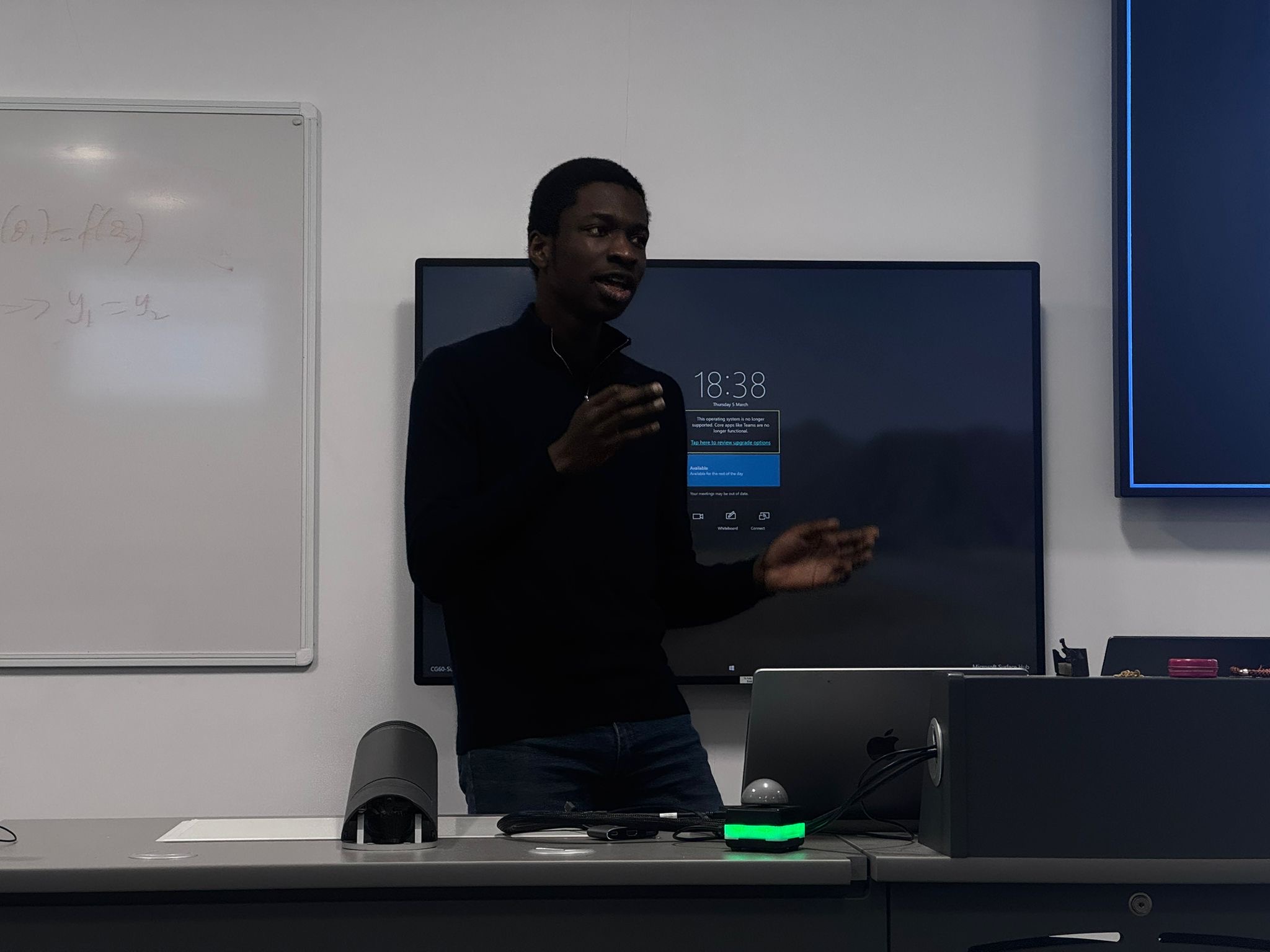 Speaker addressing the room during the AI literacy workshop.